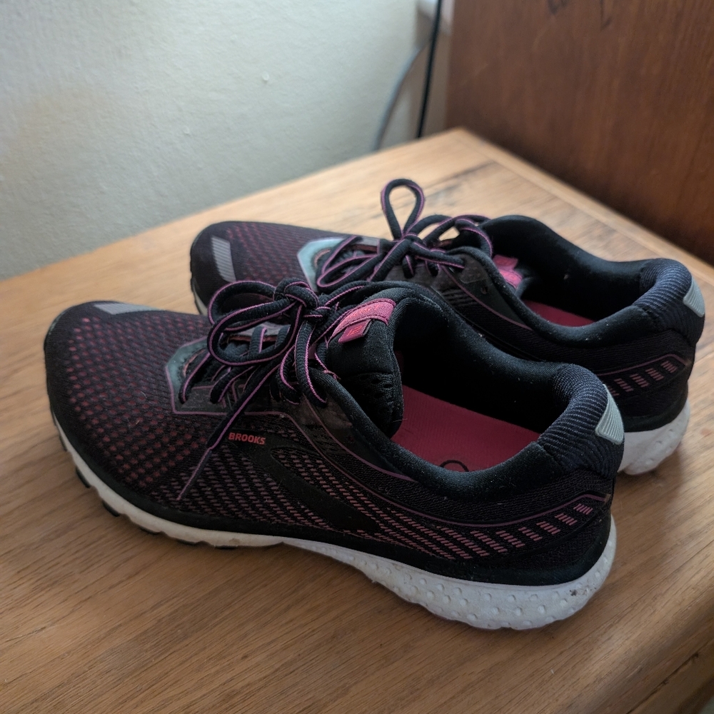 Pink and black Brooks sneakers